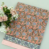 Orange print tablecloth, 72 x 132 in