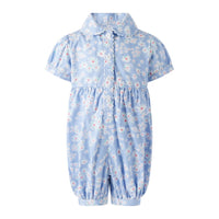 Bobbie's Shoppe blue cotton babysuit with allover daisy print, classic collar, and button-front closure.